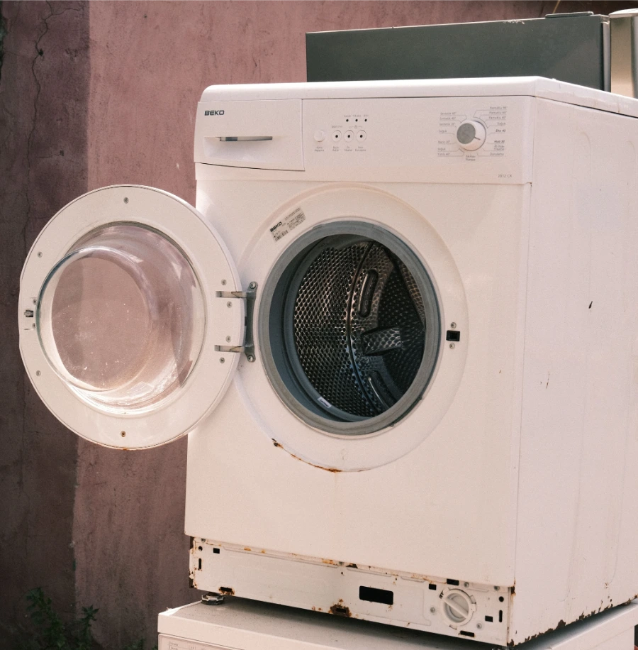 White front load dryer with the door open
